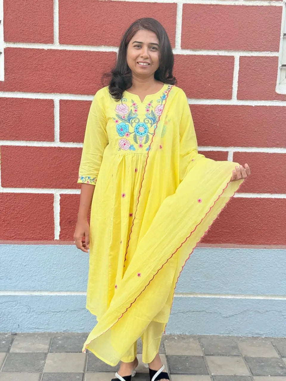 Yellow color A-line kurta set with embriodery
