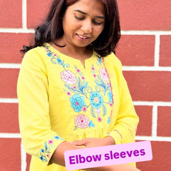 Yellow color A-line kurta set with embriodery