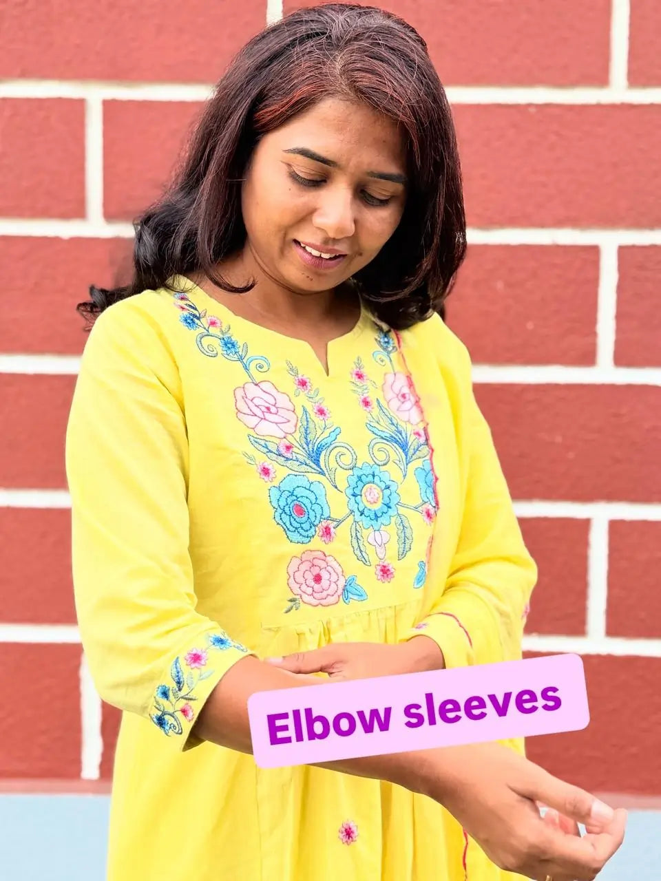 Yellow color A-line kurta set with embriodery