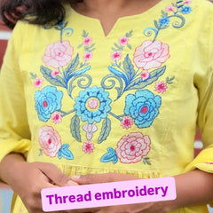 Yellow color A-line kurta set with embriodery