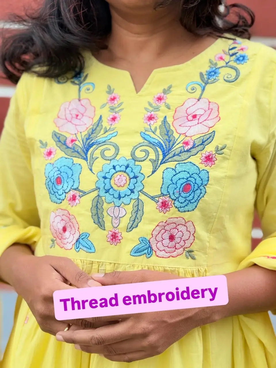 Yellow color A-line kurta set with embriodery