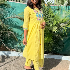 Yellow color A-line kurta set with embriodery
