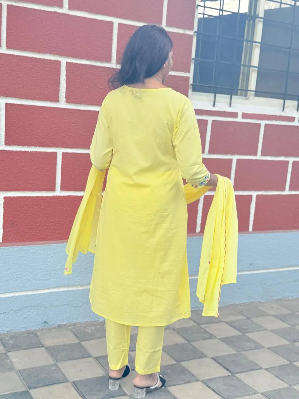 Yellow color A-line kurta set with embriodery